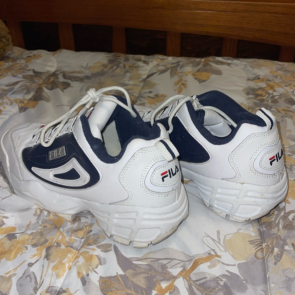 Lightly used blue and white Filas